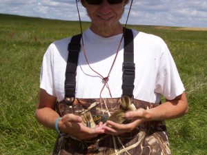 Me holding two ducklings